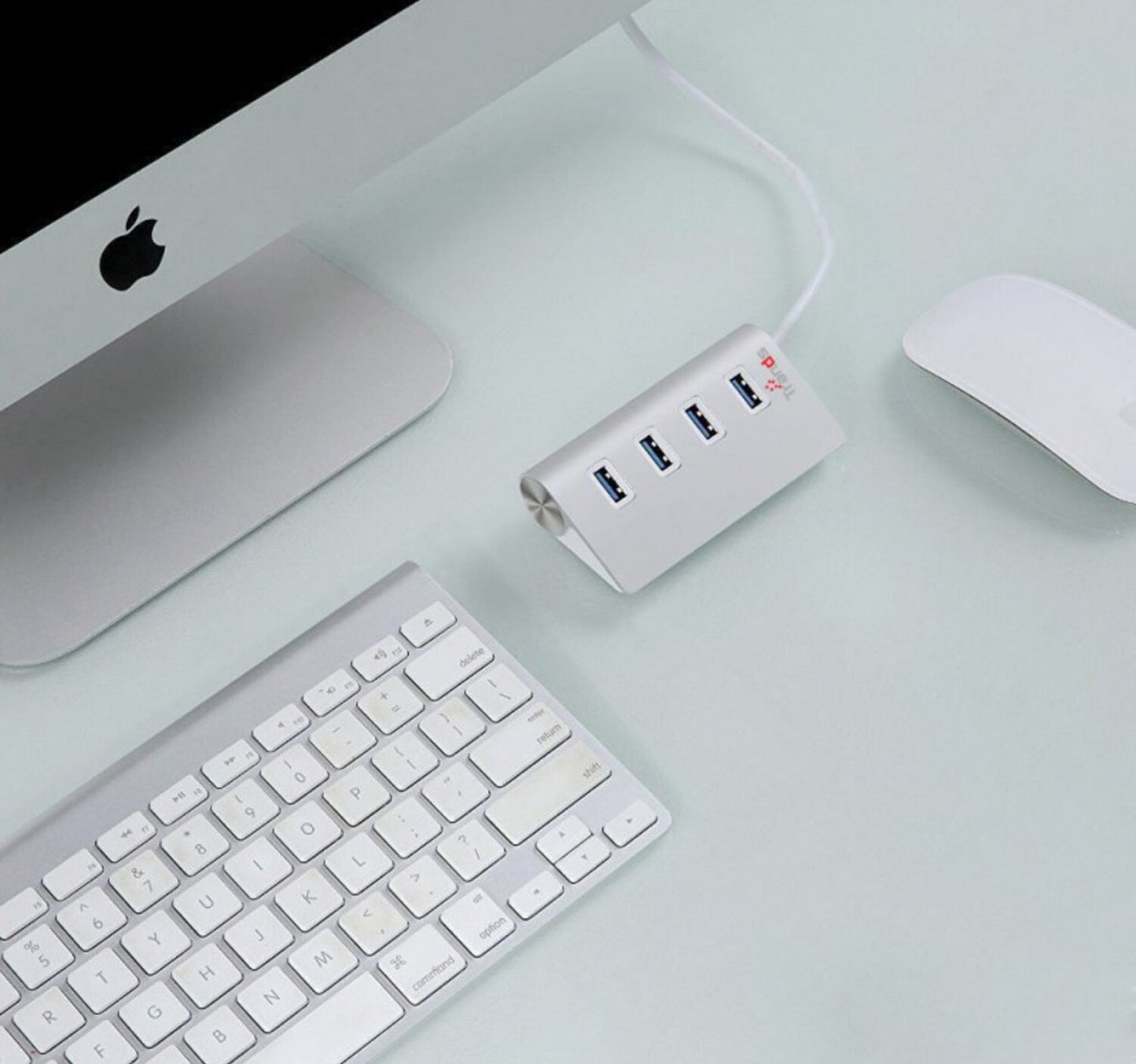 موزع USB 3.0 خارجي معدني محمول من تراندز مزود بأربعة منافذ متوافق مع جميع أنظمة التشغيل Windows/Mac/Linux HB6880