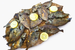 Fried Safi Fish with eggplant hamsa and shalani rice Al Lulu Kitchen